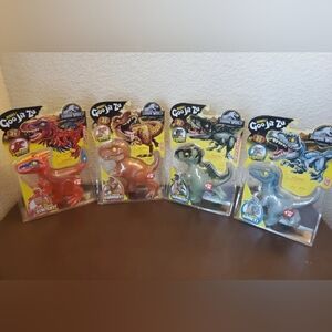 New Full Set 4 Goo Jit Zu Jurassic World Blue, T-Rex, Giganotosaurus, Pyroraptor